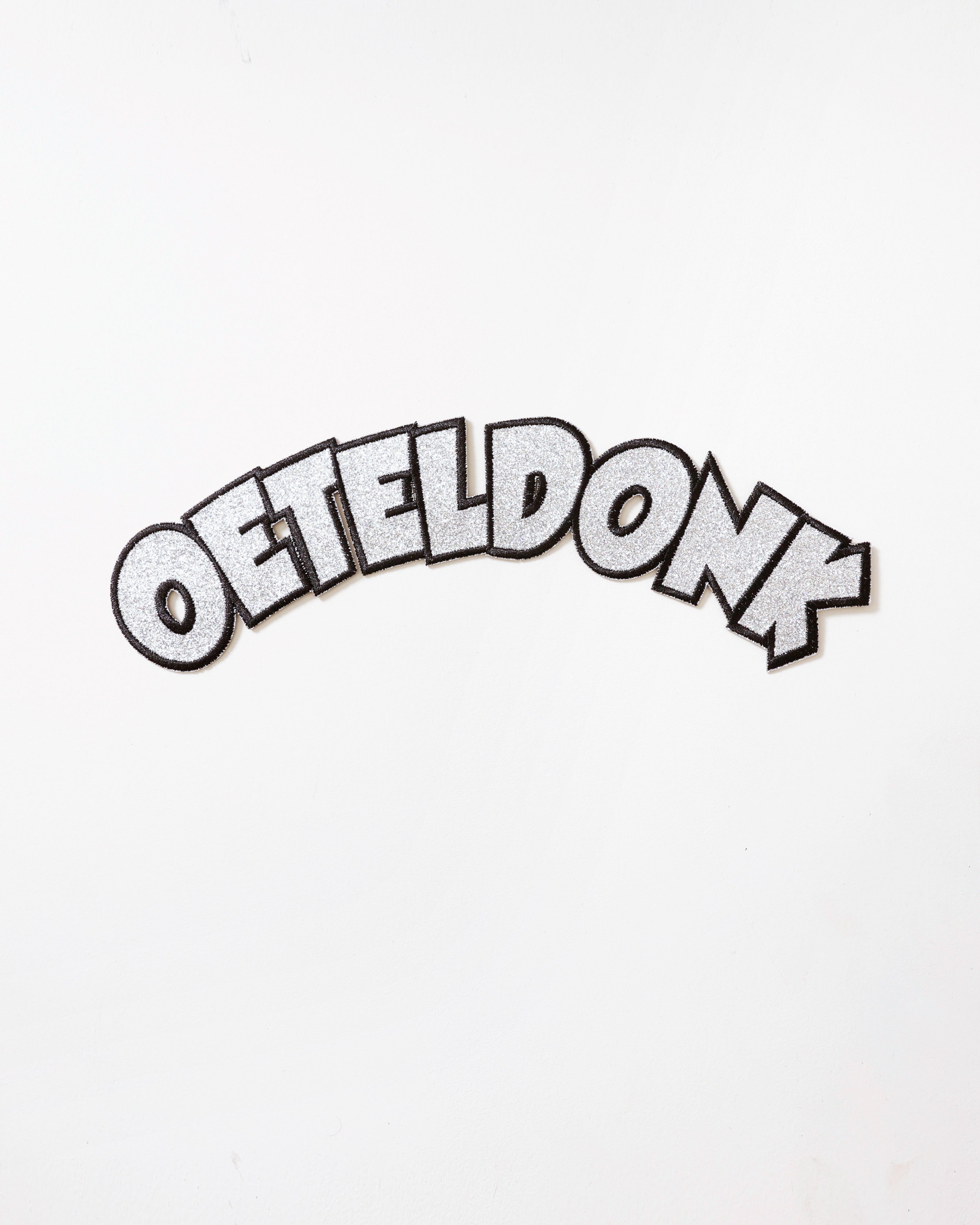 Rugembleem Oeteldonk – boog boven – zilver glitter