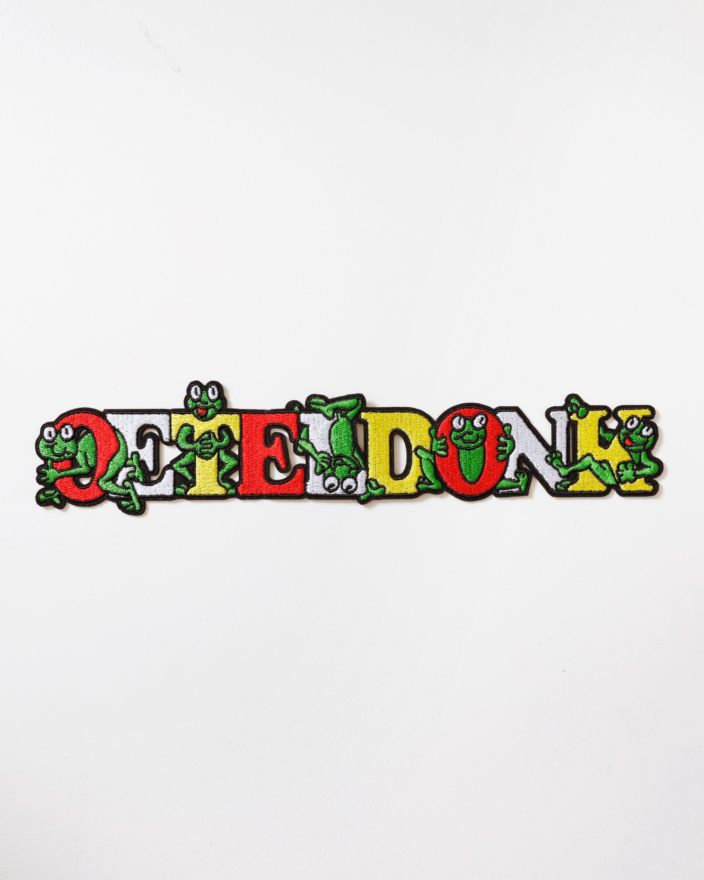 Rugembleem Oeteldonk verticaal geschreven - met kikkers in rood wit geel