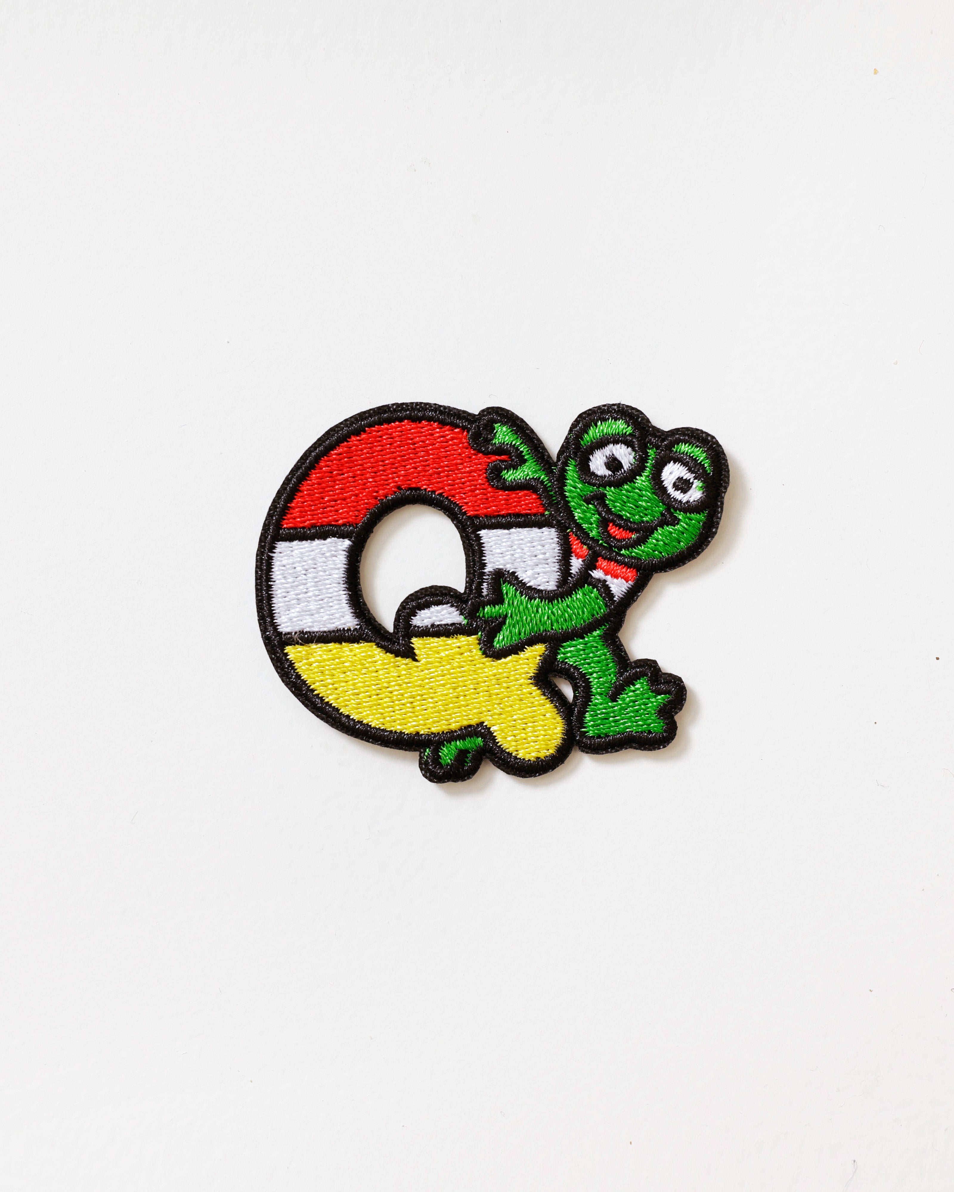 Oeteldonks Embleem Kikker Letter Q