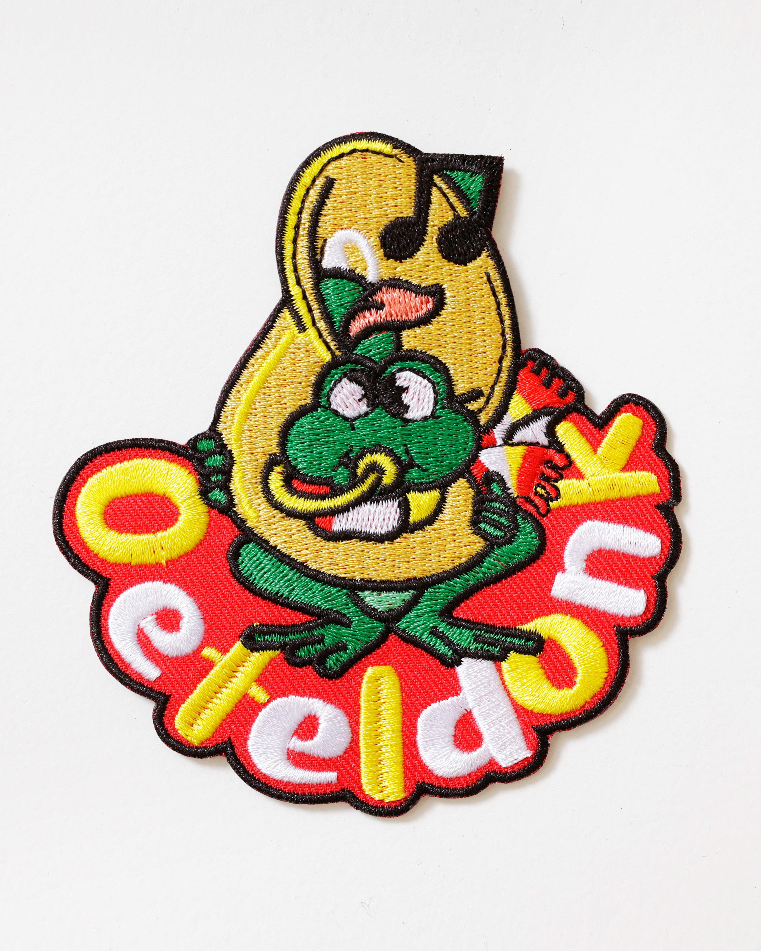 Oeteldonks embleem Op z’n Oeteldonks kikker met trompet