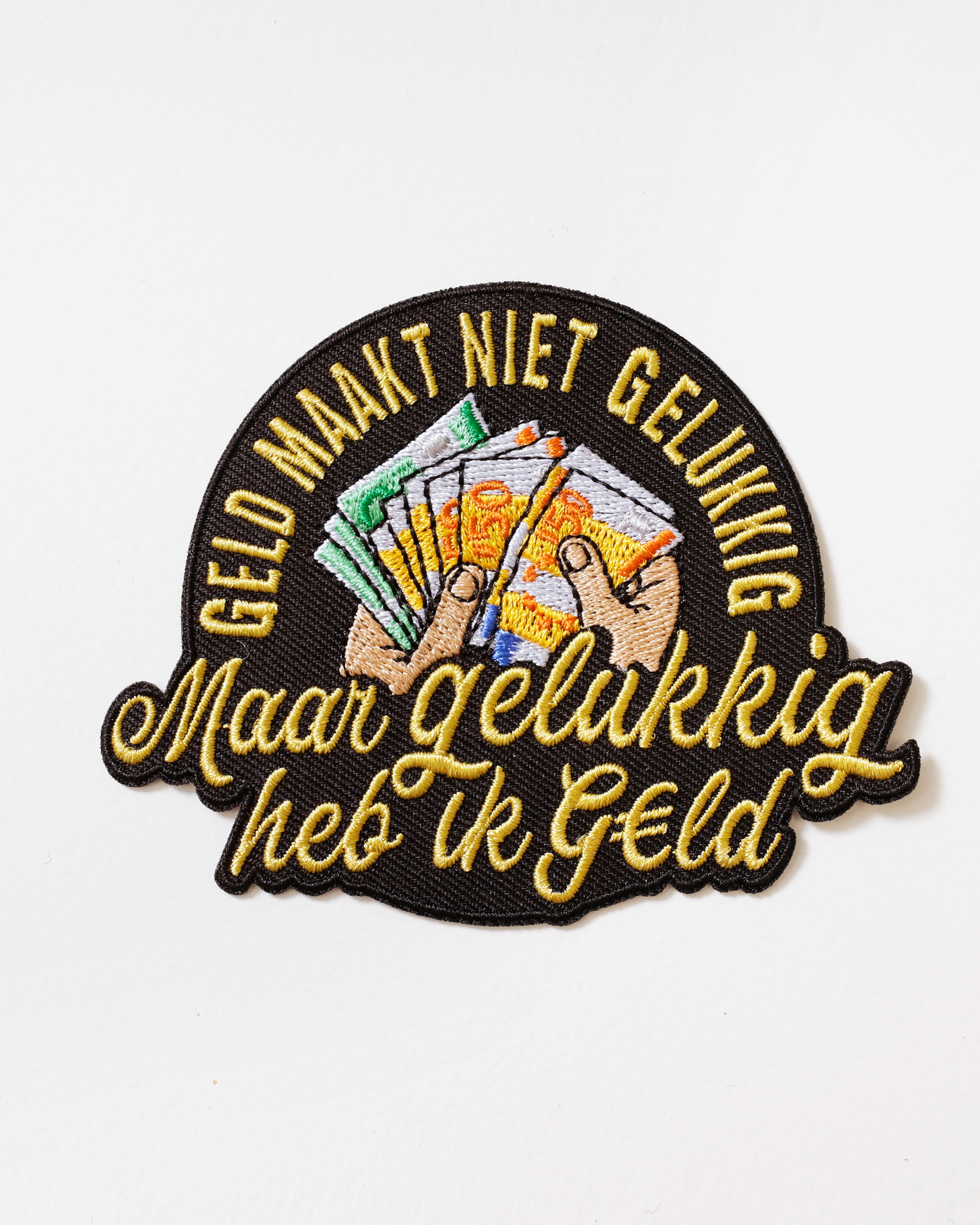 Embleem Geld maakt niet Gelukkig