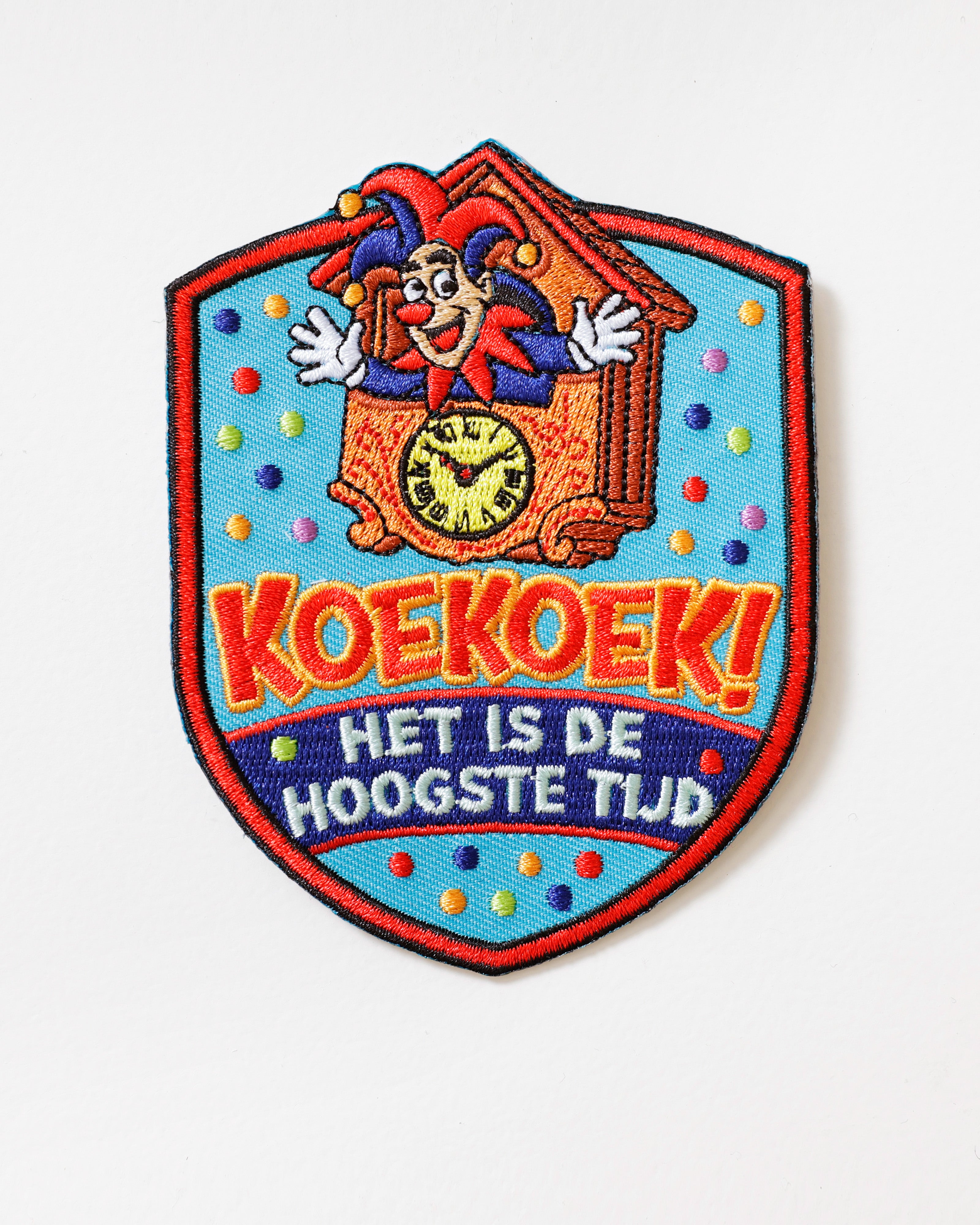 Embleem Koekoek! Het is de Hoogste Tijd